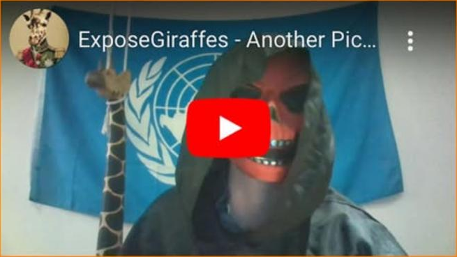 Original Anonymous recording: a hooded masked speaker before a blue backdrop.